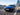Blauer Audi RS5 B10 in dynamischer Frontansicht auf der Straße mit ASR Abgasklappensteuerung RX1